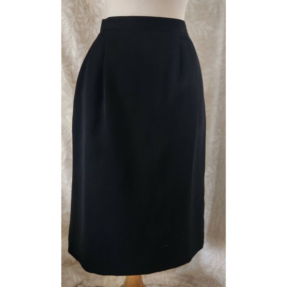 K7 Black straight lined midi skirt w/front pleats, back zipper W/button & slit